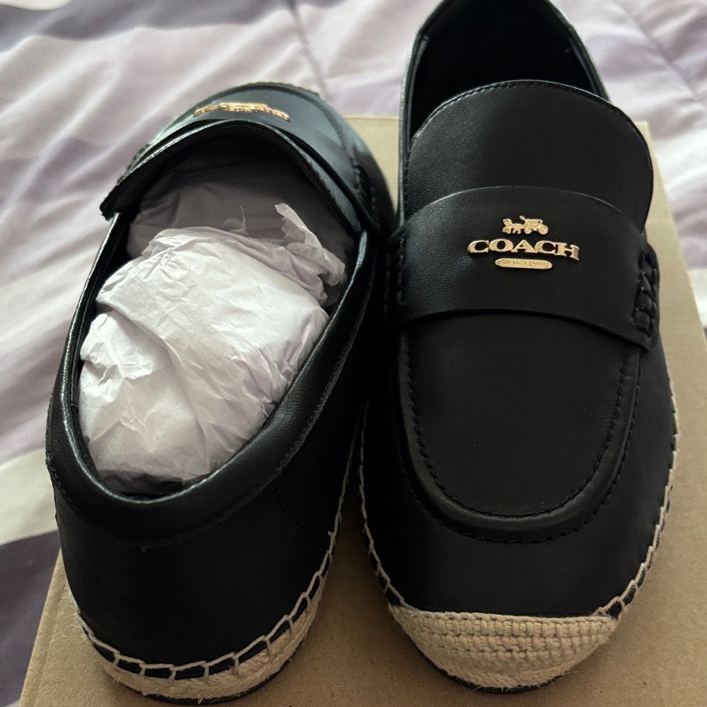 Brand new Coach Black Loafers with Gold Accents